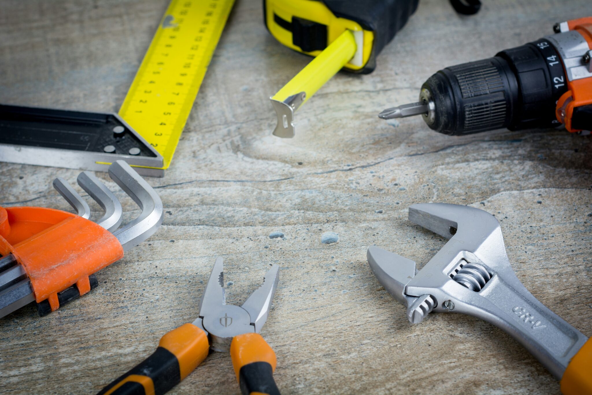 A selection of tools a home service or building trades contractor would use.